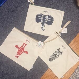 Ubuntu Earth Geometric Animal Canvas Pouch Trio - Elephant, Giraffe, Zebra
